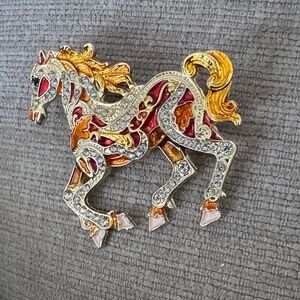 Elegant Horse Brooch with Gold and Red Accents